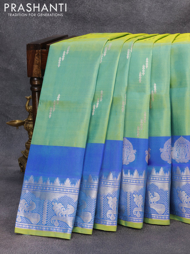 Venkatagiri silk saree dual shade of teal green and cs blue with silver zari woven buttas and silver zari woven butta border