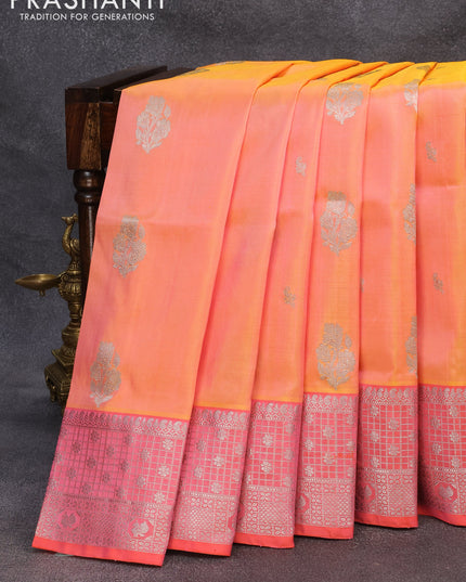 Venkatagiri silk saree dual shade of yellowish peach and orange with silver zari woven floral buttas and rich silver zari woven border