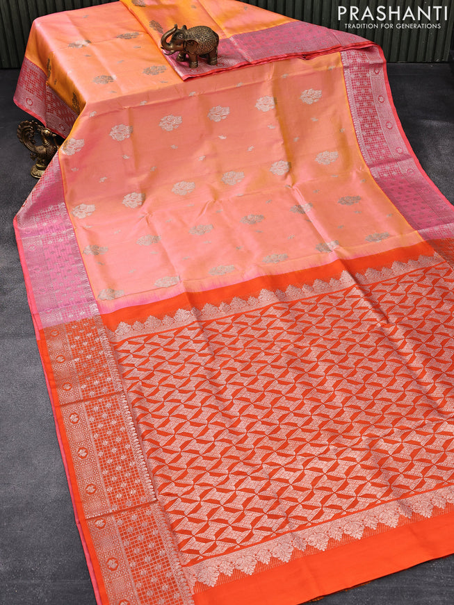 Venkatagiri silk saree dual shade of yellowish peach and orange with silver zari woven floral buttas and rich silver zari woven border