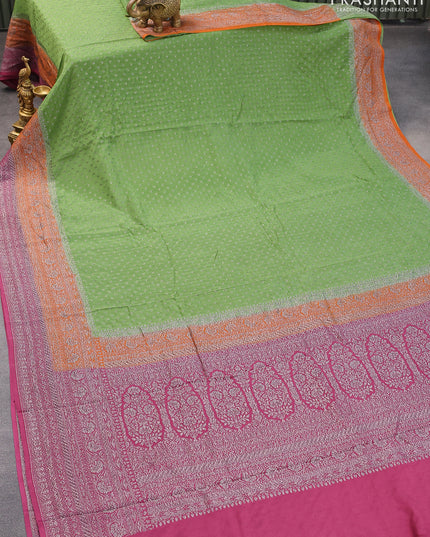 Pure banarasi crepe silk saree green shade and orange wine shade with allover thread & silver zari woven buttas and woven border