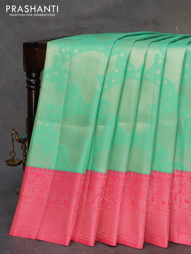Banarasi softy silk saree teal green and candy pink with allover zari weaves and silver zari woven border