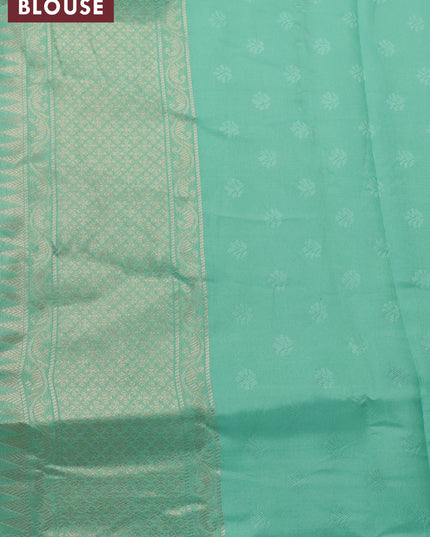 Banarasi softy silk saree peach orange and teal green with allover zari weaves and silver zari woven border