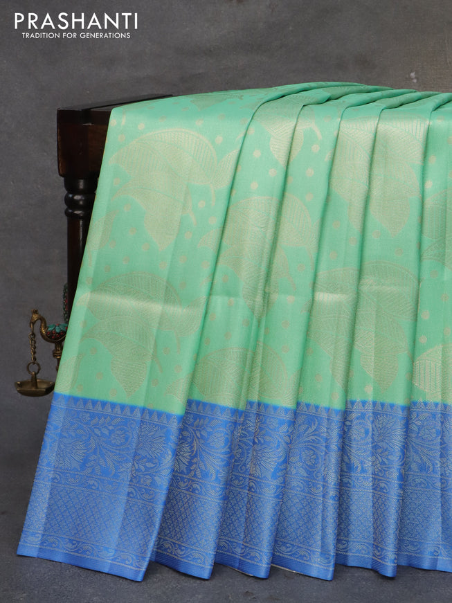 Banarasi softy silk saree teal green and royal blue with allover zari weaves and silver zari woven border