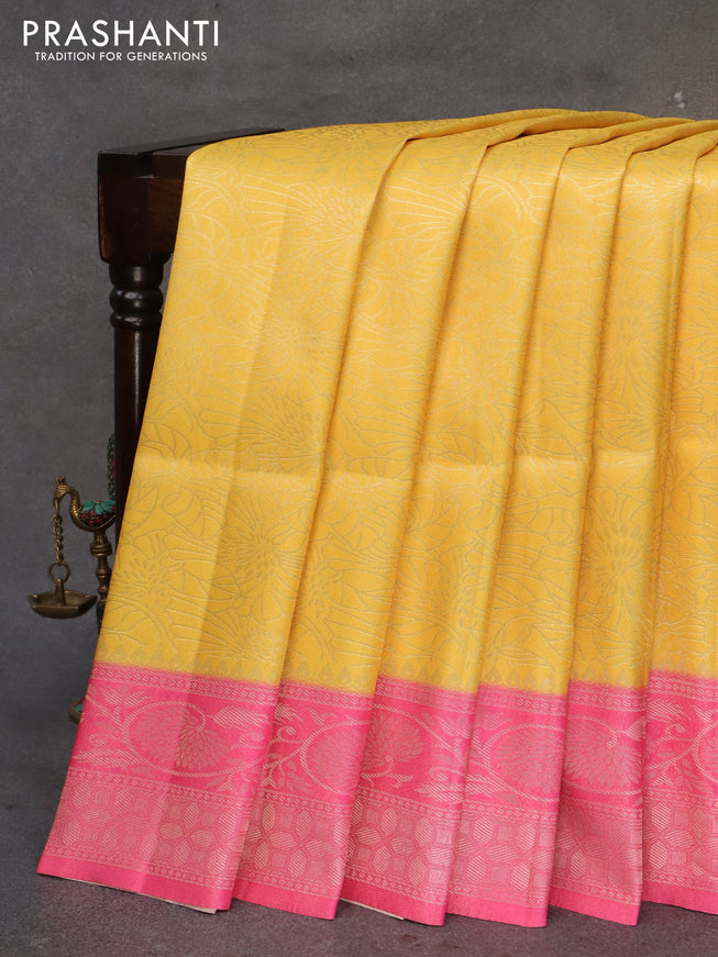 Banarasi softy silk saree yellow and pink with allover zari weaves and zari woven border