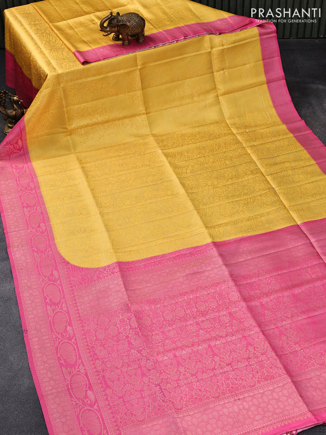 Banarasi softy silk saree yellow and pink with allover zari weaves and zari woven border