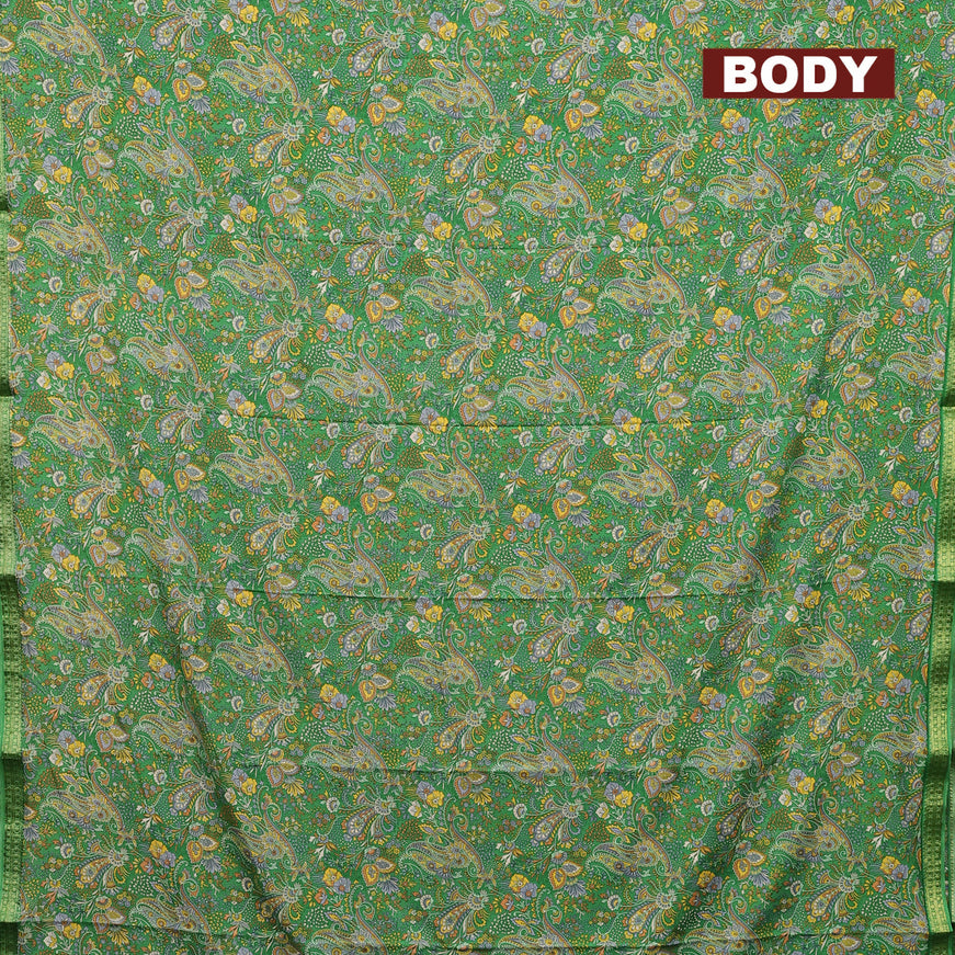 Semi crepe saree light green with allover prints and zari woven border