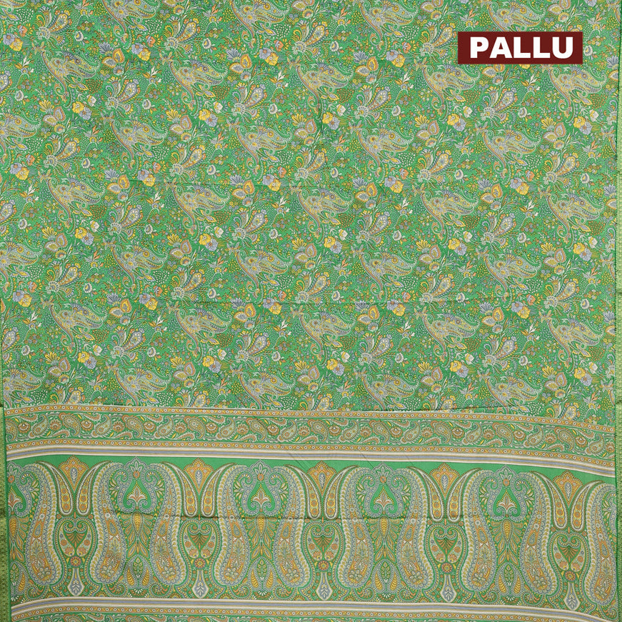 Semi crepe saree light green with allover prints and zari woven border