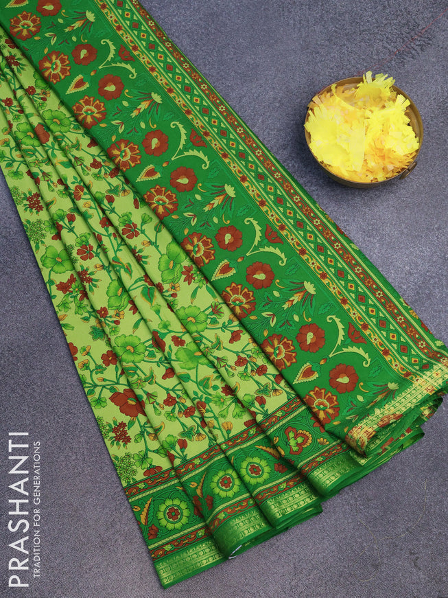 Semi crepe saree light green and green with allover floral prints and zari woven border