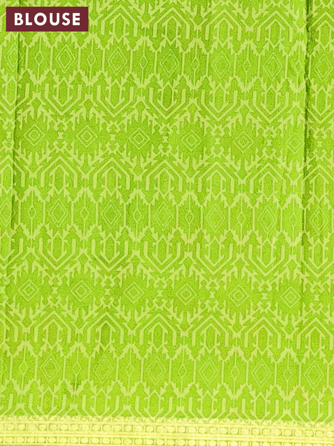 Semi crepe saree light green and green with allover floral prints and zari woven border