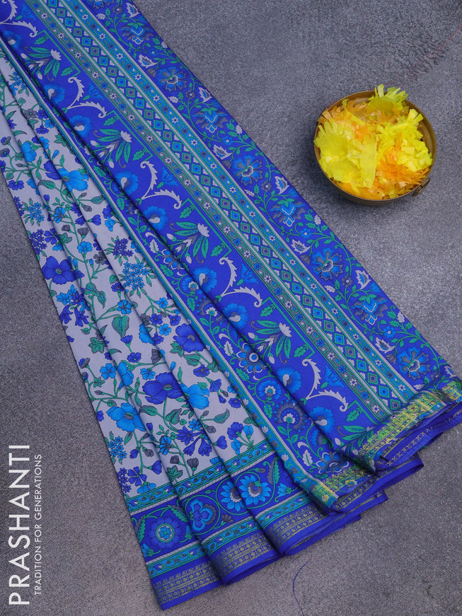 Semi crepe saree grey and blue with allover floral prints and zari woven border