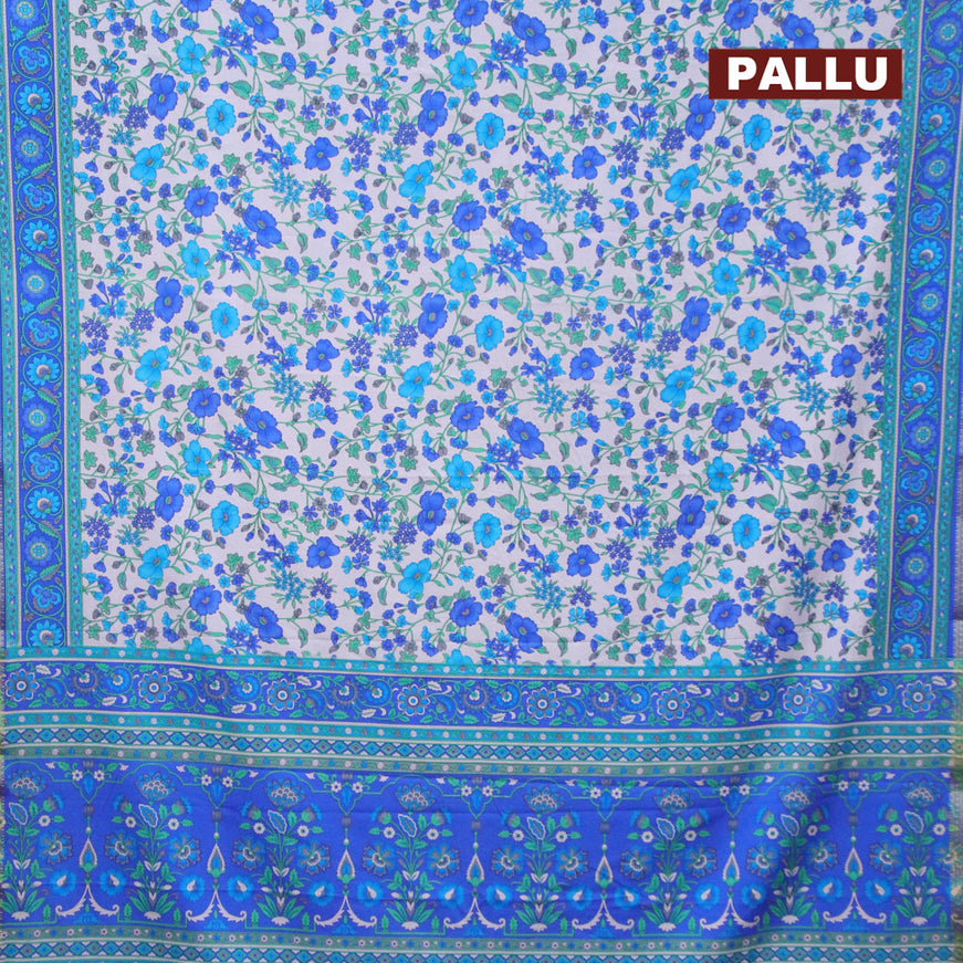Semi crepe saree grey and blue with allover floral prints and zari woven border