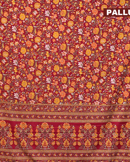 Semi crepe saree maroon with allover floral prints and zari woven border
