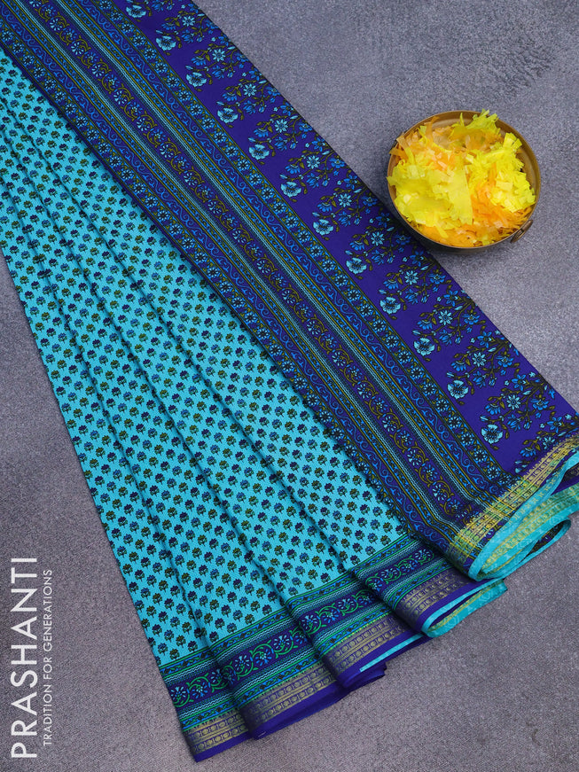 Semi crepe saree teal blue and blue with allover floral prints and zari woven border
