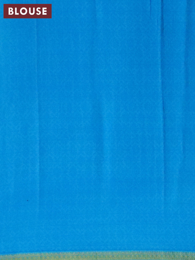Semi crepe saree blue with allover prints and zari woven border