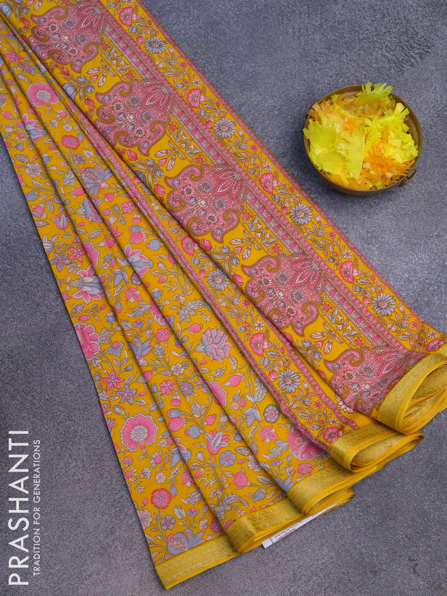 Semi crepe saree yellow with allover prints and zari woven border