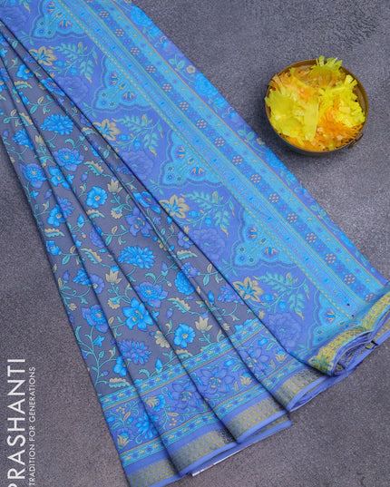 Semi crepe saree grey and blue with floral prints and zari woven border