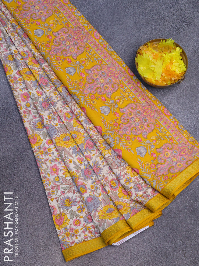 Semi crepe saree off white and yellow with floral prints and zari woven border