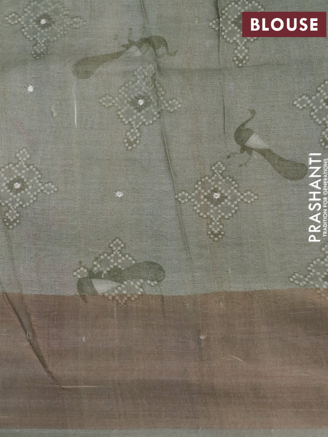 Pure tussar silk saree elaichi green and greyish green with allover pichwai prints & embroidery work and zari woven border