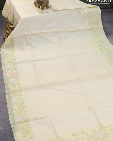 Pure tussar silk saree off white and pale yellow with plain body and floral embroidery work border