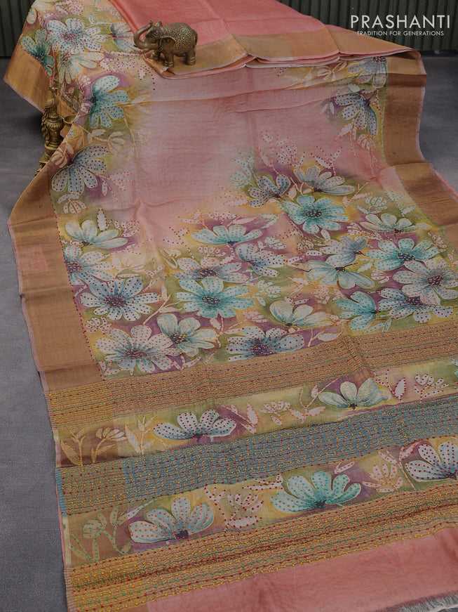 Pure tussar silk saree multi colour and pastel peach with allover floral prints & french knot work and zari woven border