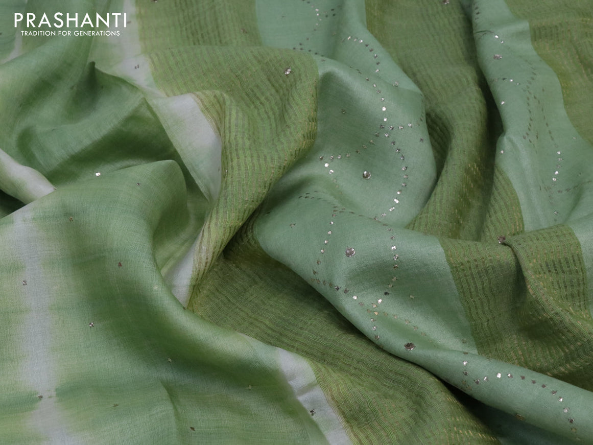 Pure tussar silk saree green shade and off white with tie and dye prints & embroidery buttas and zari woven border