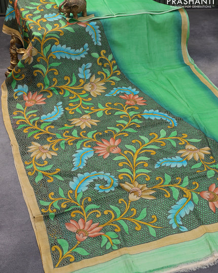 Pure tussar silk saree light green with plain body and kalamkari printed cut work pallu