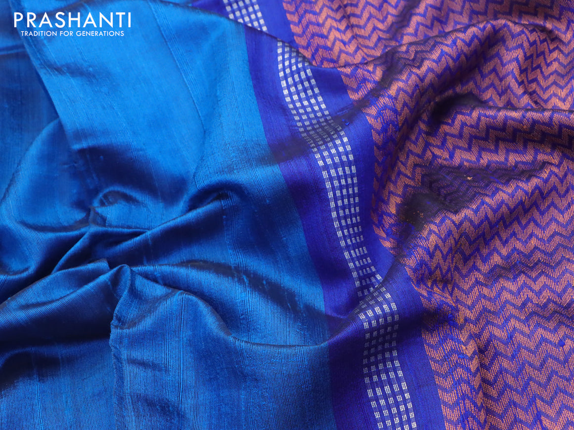 Pure dupion silk saree cs blue and blue with silver & copper zari woven buttas and zari woven butta border