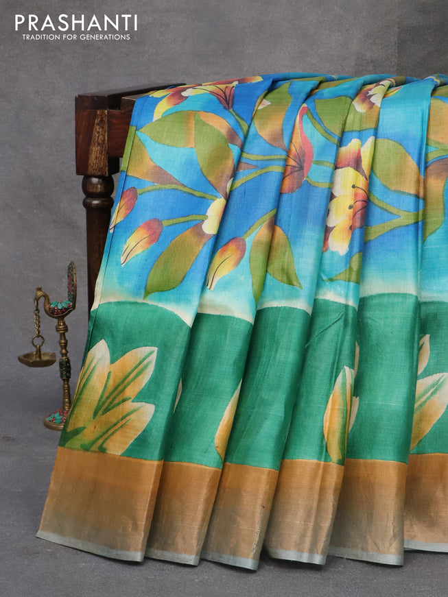 Pure tussar silk saree blue shade and grey shade with allover hand painted floral prints and zari woven border