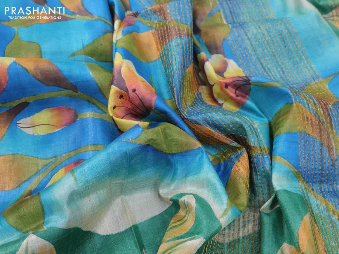Pure tussar silk saree blue shade and grey shade with allover hand painted floral prints and zari woven border