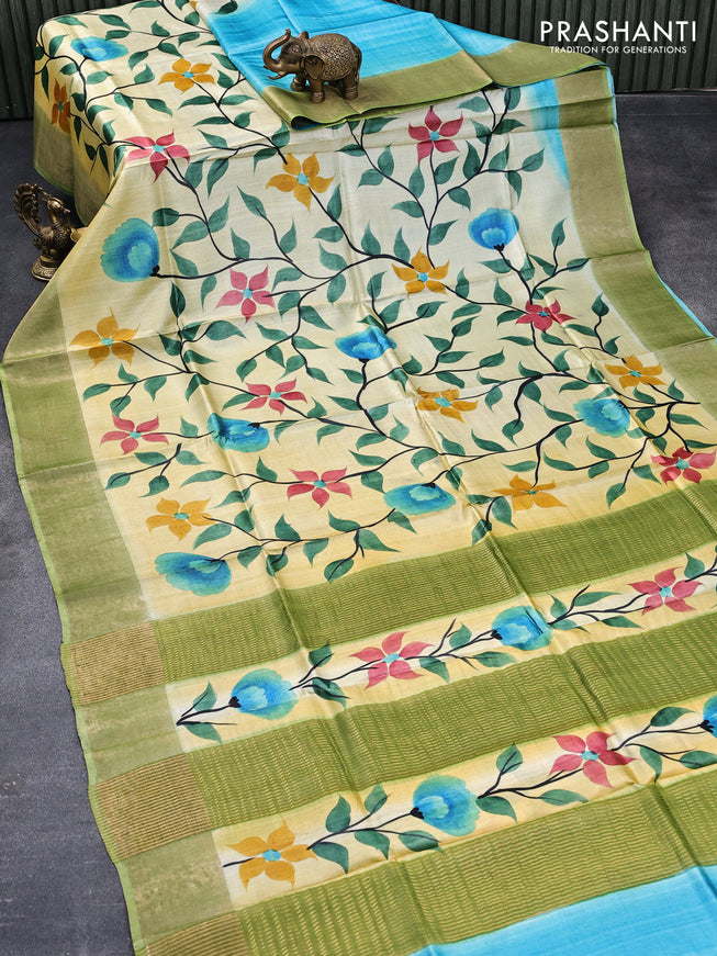 Pure tussar silk saree cream pale yellow and blue with floral hand painted prints and zari woven border