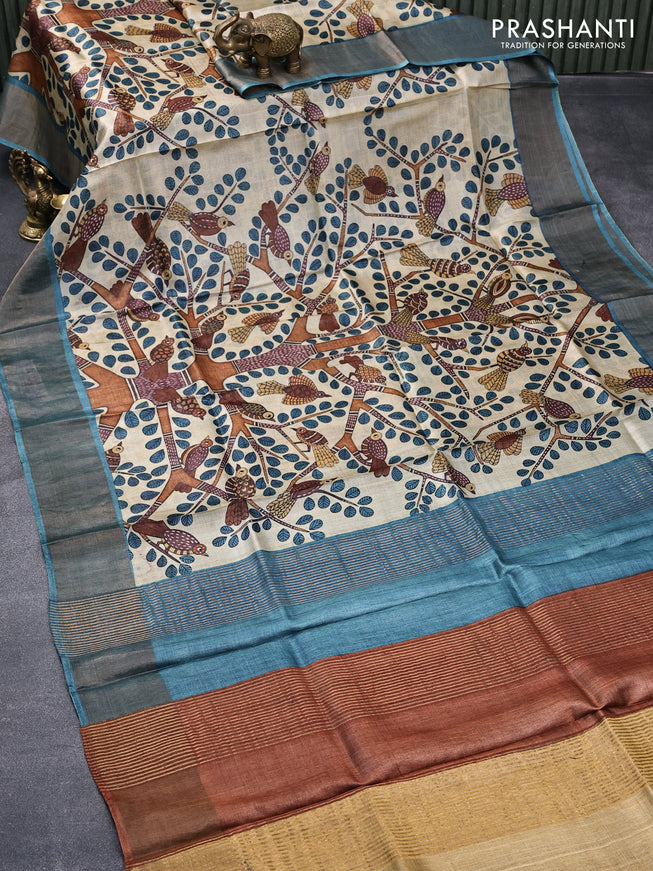 Pure tussar silk saree cream and peacock blue with allover prints and zari woven border