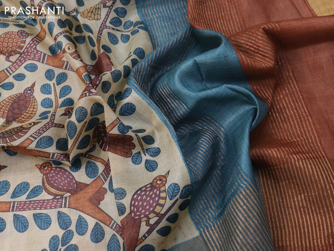 Pure tussar silk saree cream and peacock blue with allover prints and zari woven border