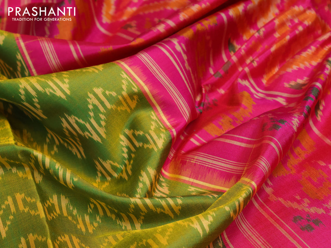 Rajkot patola silk saree dual shade of green and pink with allover ikat weaves and zari woven border