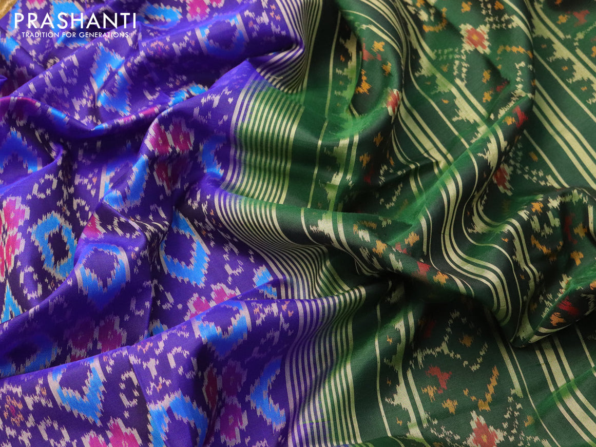 Rajkot patola silk saree blue and dark green with allover ikat weaves and simple border