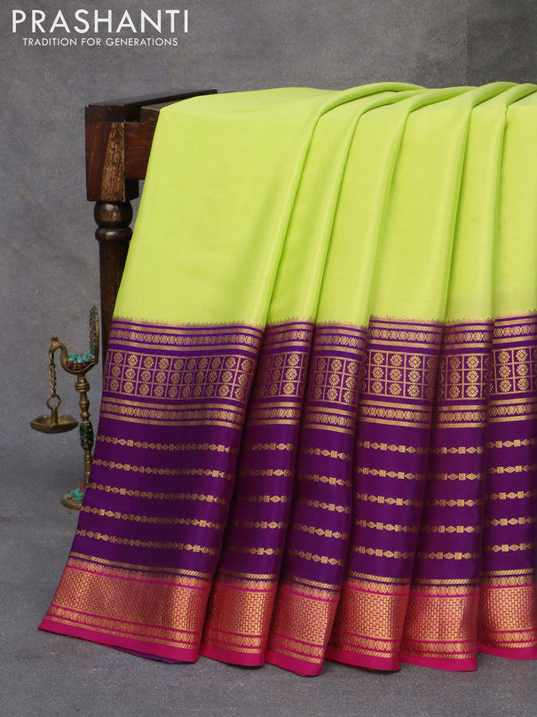 Pure mysore silk saree fluorescent green and purple with plain body and long rich zari woven border