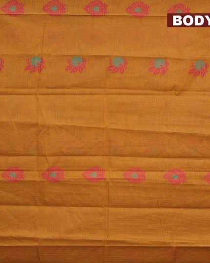 Nithyam cotton saree mustard yellow and pink with allover thread weaves and zari woven simple border