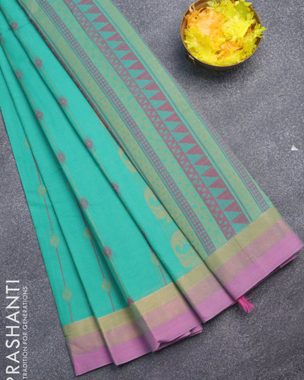 Nithyam cotton saree teal green and pink shade with allover thread weaves and zari woven simple border