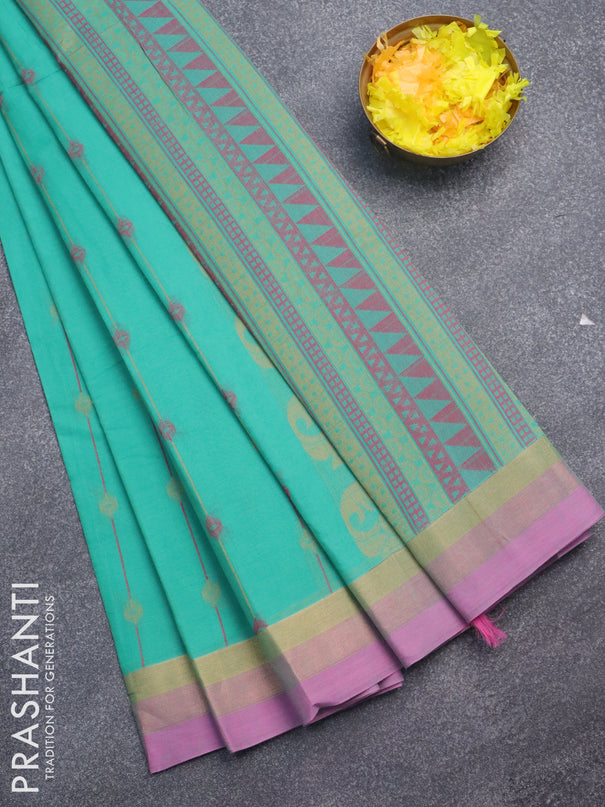 Nithyam cotton saree teal green and pink shade with allover thread weaves and zari woven simple border