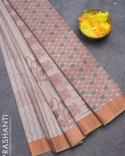 Nithyam cotton saree beige and sandal with allover thread weaves and zari woven border