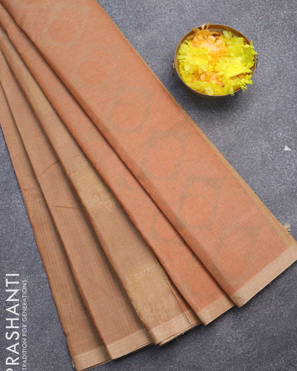 Nithyam cotton saree chikku shade with allover copper zari weaves & zari buttas in borderless style