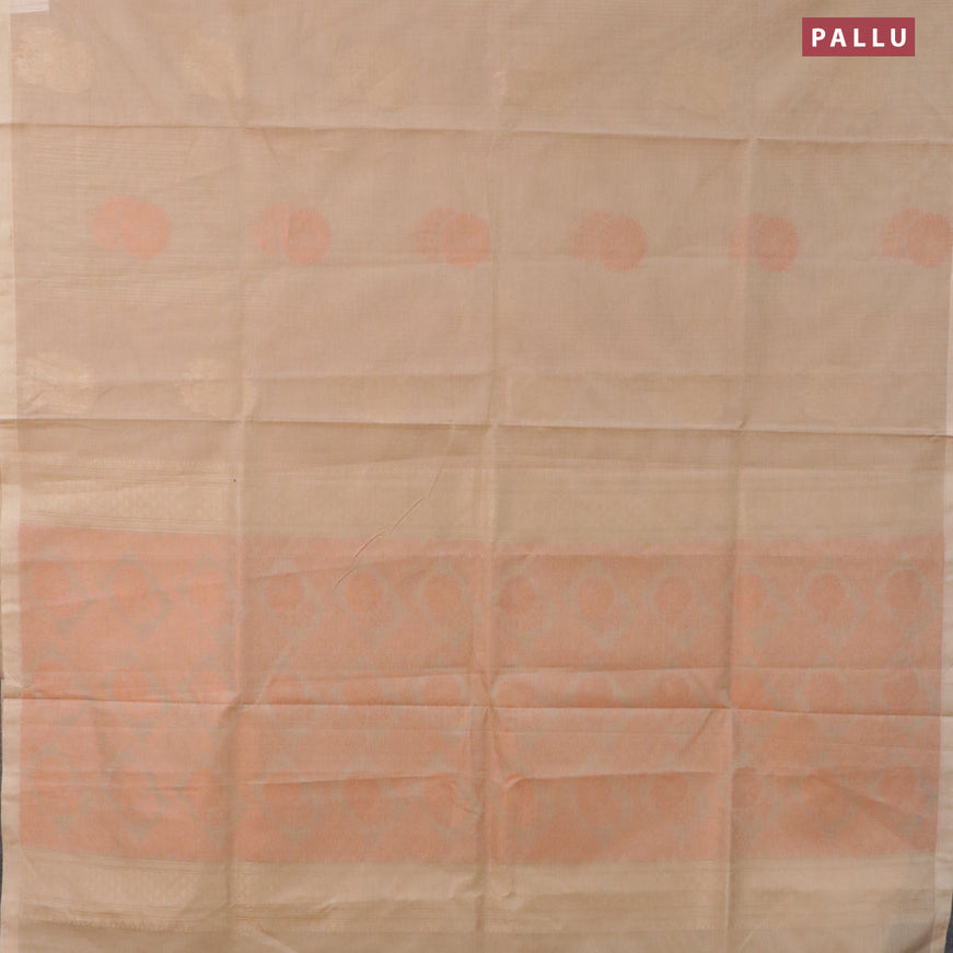 Nithyam cotton saree beige with allover copper zari weaves & zari buttas in borderless style