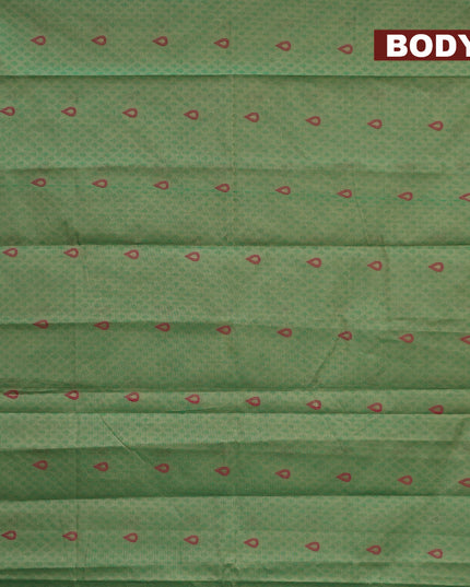 Nithyam cotton saree green and dual shade of maroon with allover self emboss & thread buttas and simple border