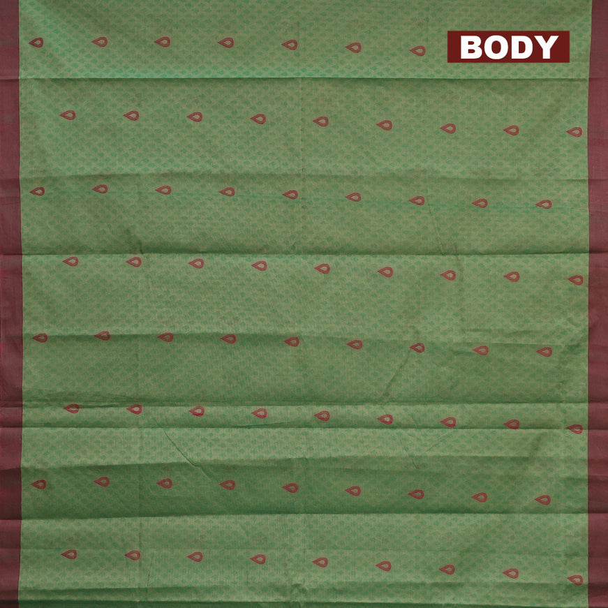 Nithyam cotton saree green and dual shade of maroon with allover self emboss & thread buttas and simple border