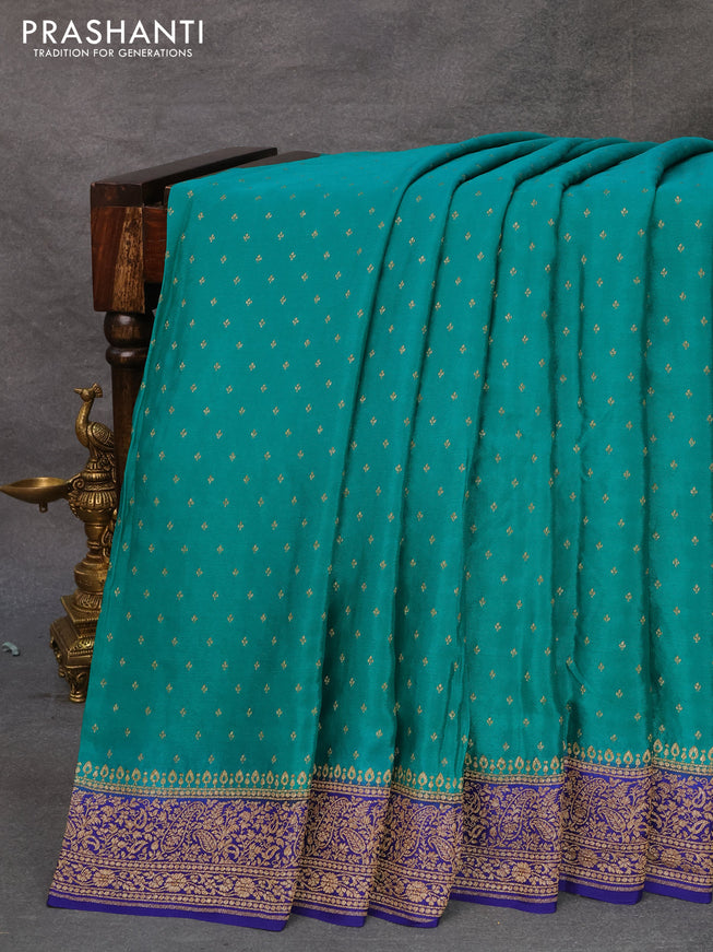 Pure banarasi crepe silk saree teal green and blue with allover thread & zari butta weaves and woven border