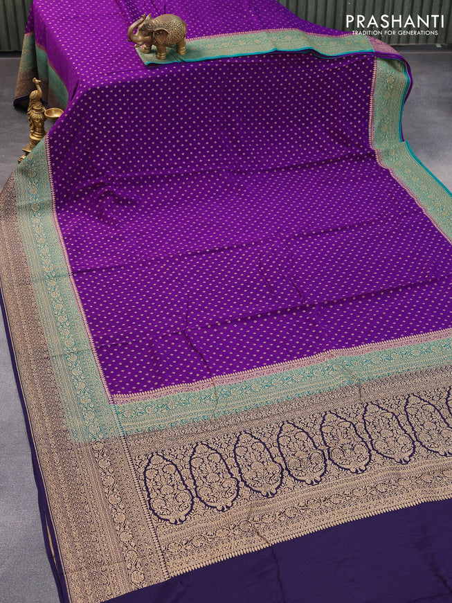 Pure banarasi crepe silk saree violet and teal blue dark blue with allover thread & zari butta weaves and woven border