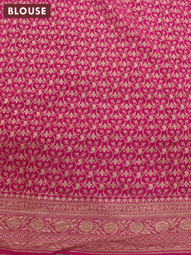 Pure banarasi crepe silk saree green and orange pink with allover thread & zari butta weaves and woven border
