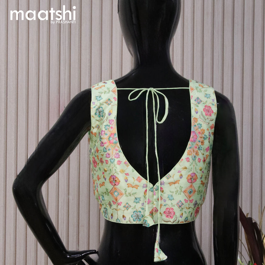 Raw silk readymade blouse pista green with embroidery work & V shape neck pattern and back open & sleeve attached