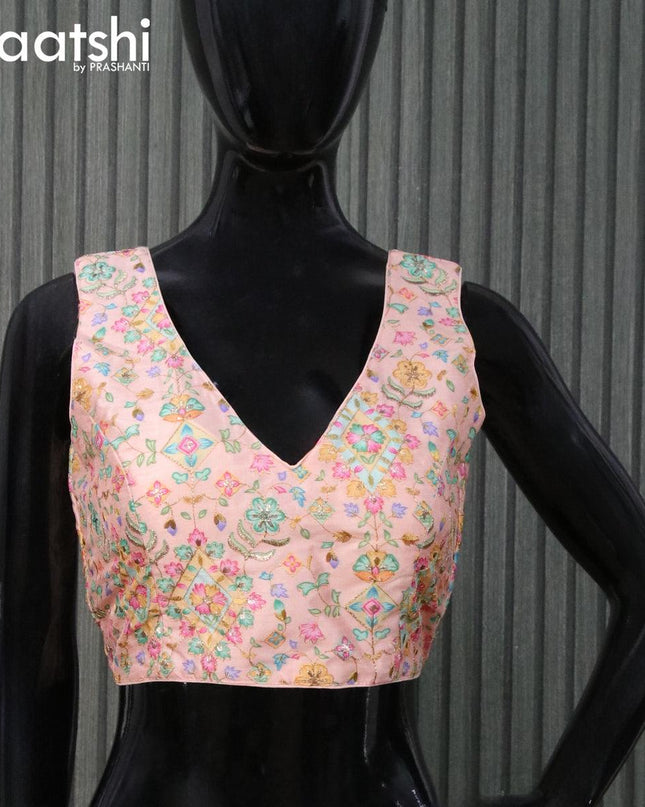 Raw silk readymade blouse pastel peach with embroidery work & V shape neck pattern and back open & sleeve attached