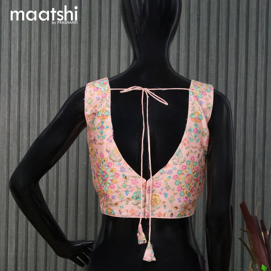 Raw silk readymade blouse pastel peach with embroidery work & V shape neck pattern and back open & sleeve attached