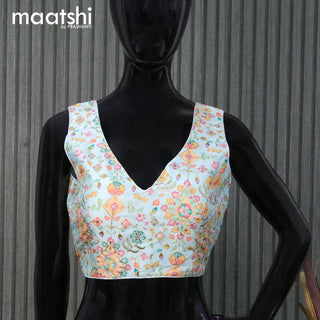 Raw silk readymade blouse teal blue shade with embroidery work & V shape neck pattern and back open & sleeve attached